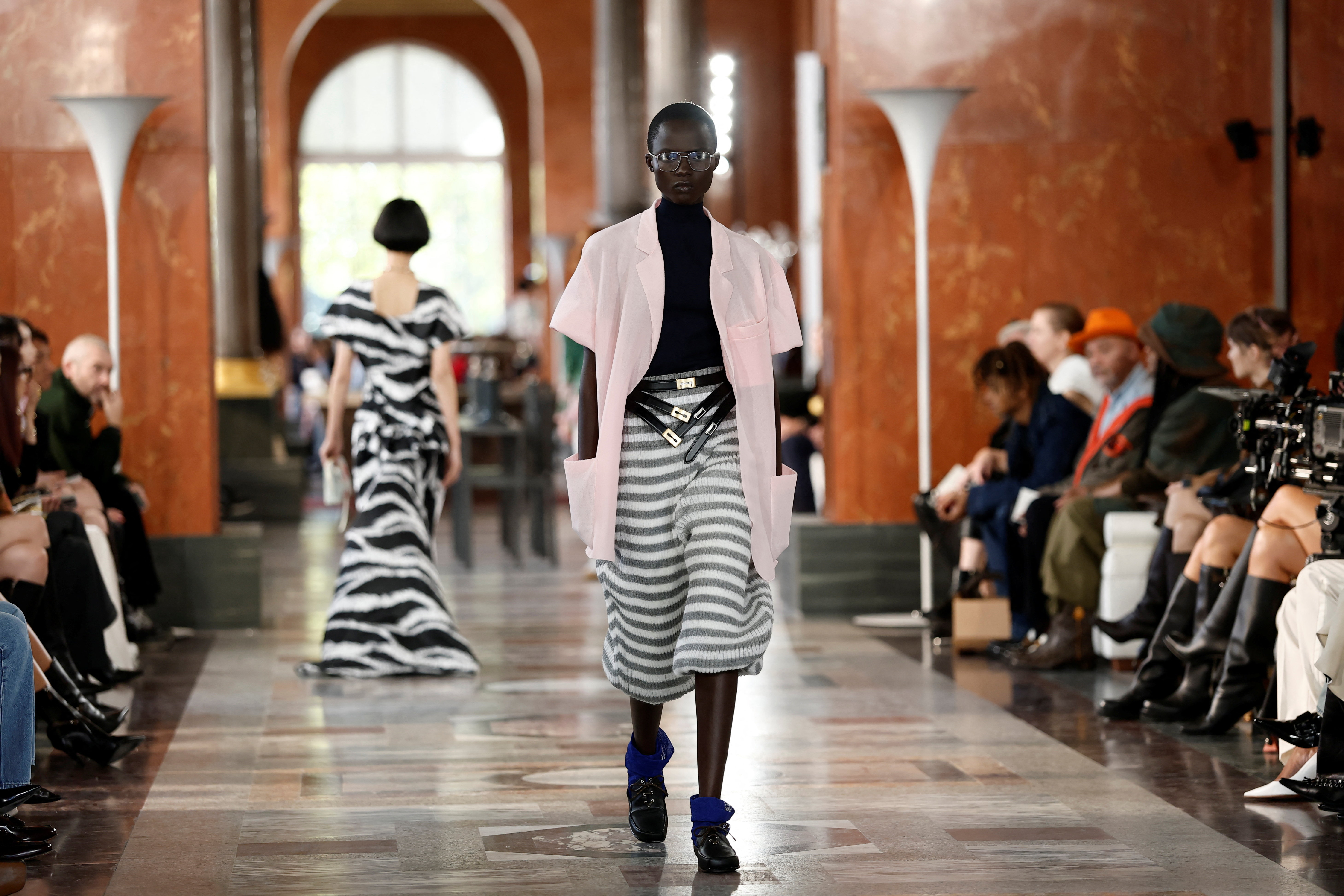 Models present creations by designer Nicolas Ghesquiere as part of his SpringSummer 2026 Women's ready-to-wear collection show for the fashion house Louis Vuitton during Paris Fashion Week in Paris, France, September 30 (AP)
